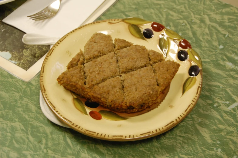 some food is on a small plate with some napkin