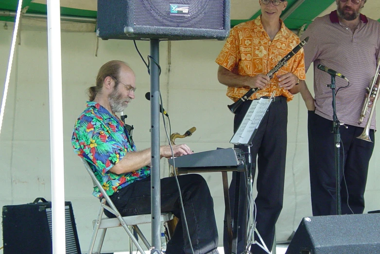 there are some musicians playing on the stage