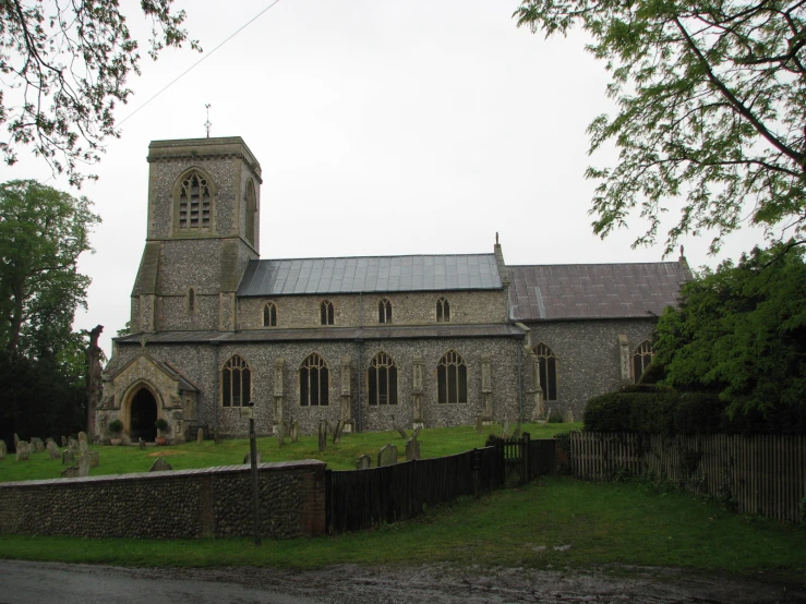 a large old stone building with an steeple