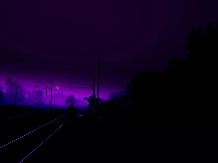 a train track with trees in the background