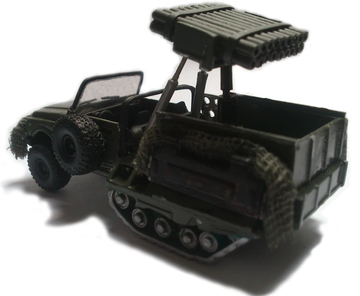 toy truck sitting on a table on top of a white floor