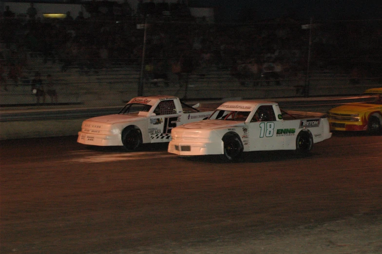 two cars sitting on top of a track