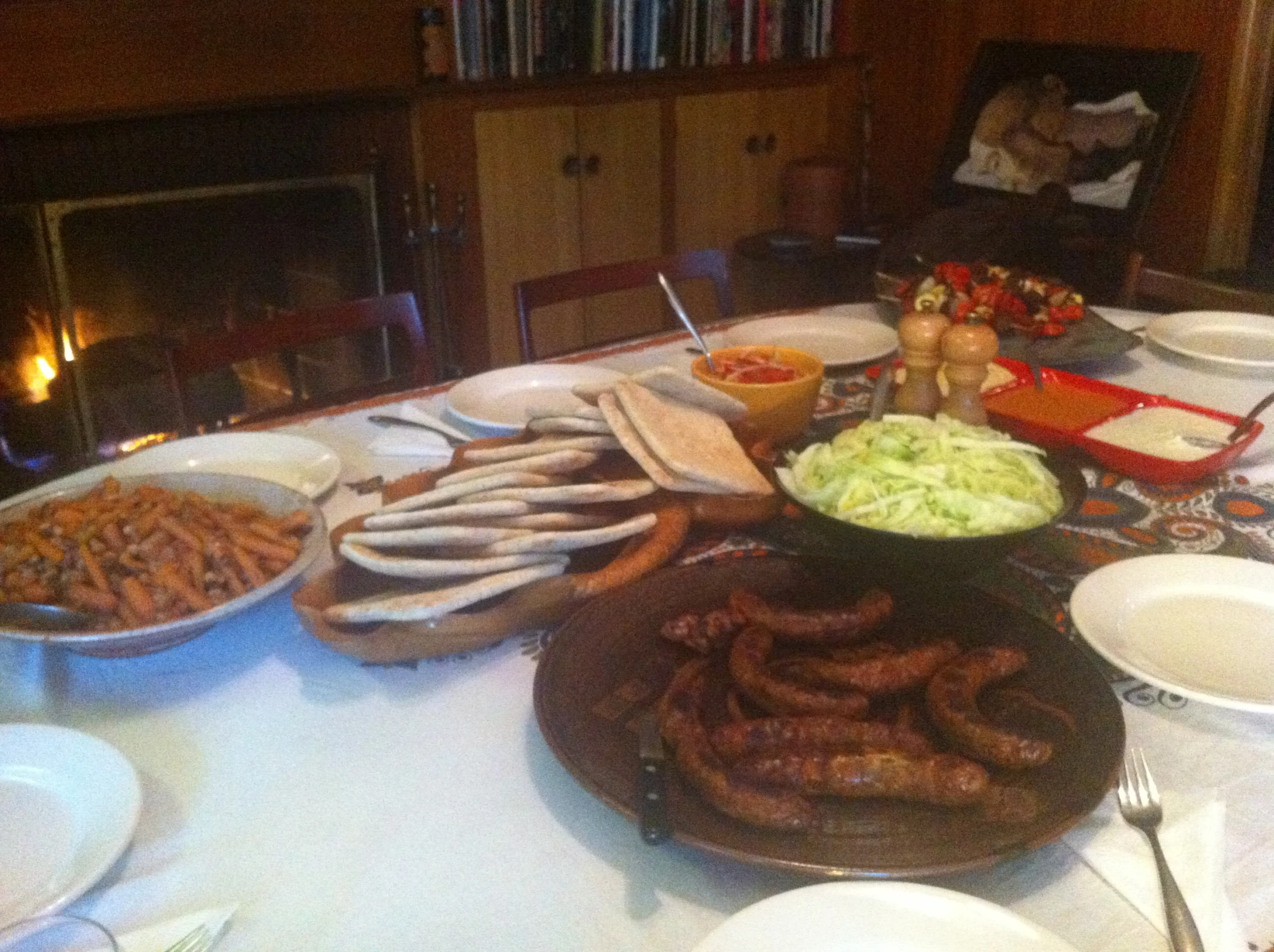 there is a buffet of several different foods on a table