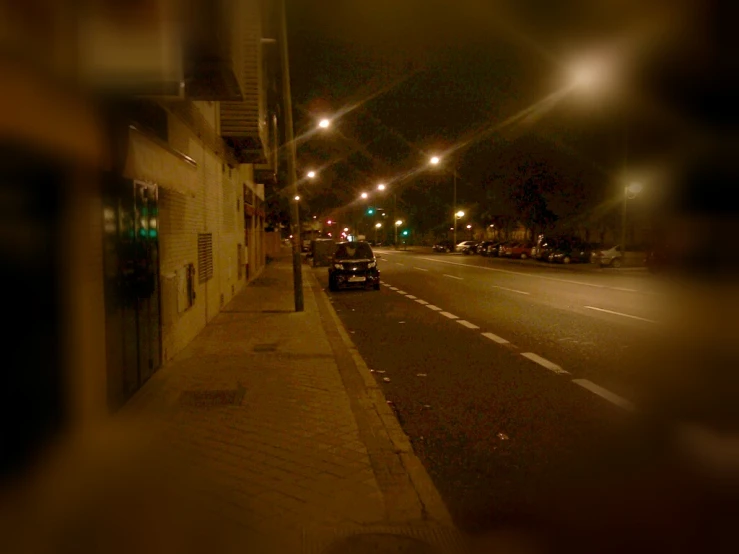 a street light shines on the night sky