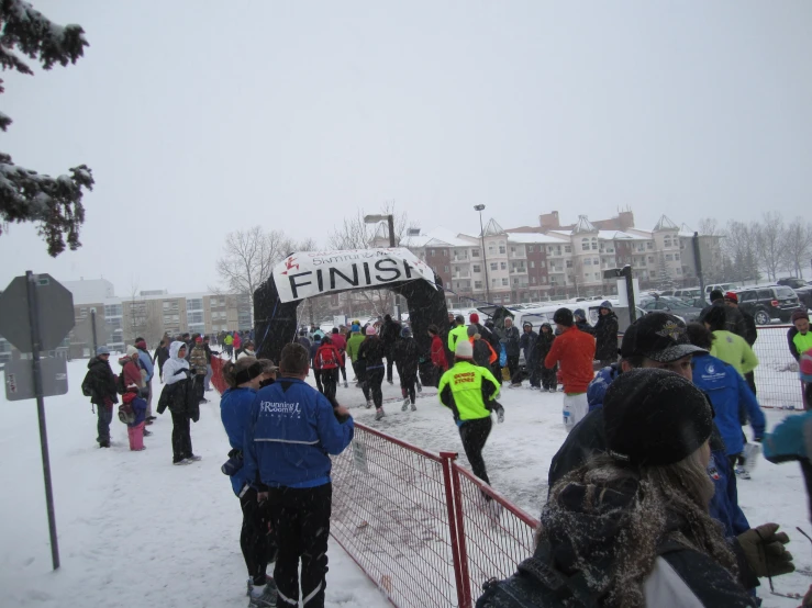 a snowy ski resort with many people on it