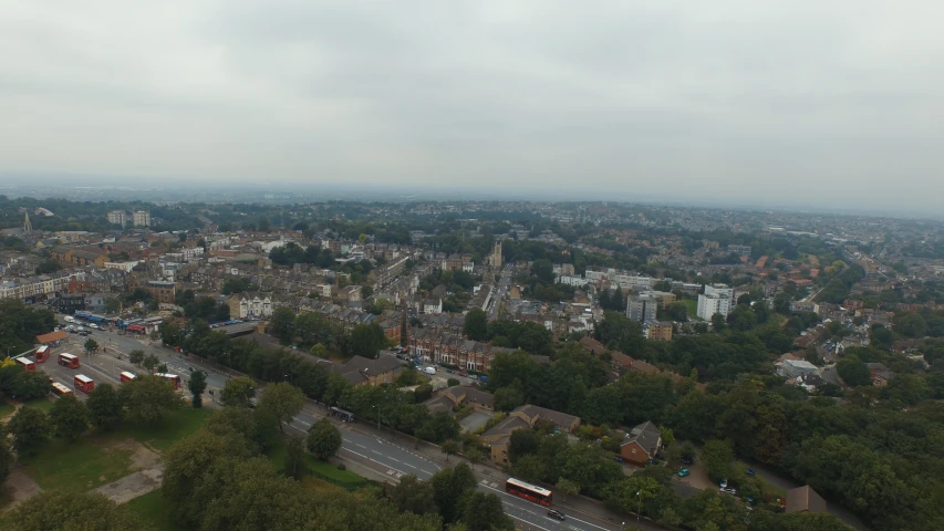 an aerial s of a city with buses