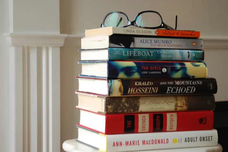 a stack of books stacked on top of each other