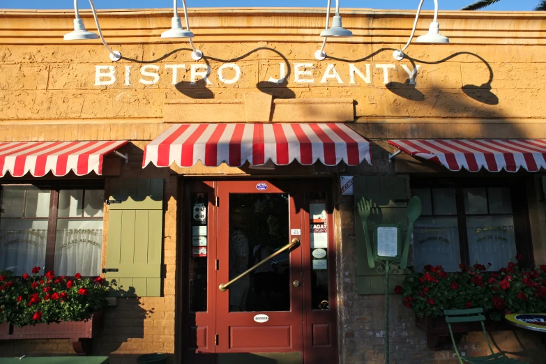 a small pizza joint located in front of a business