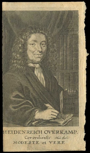 an old book with a drawing of a man wearing a suit