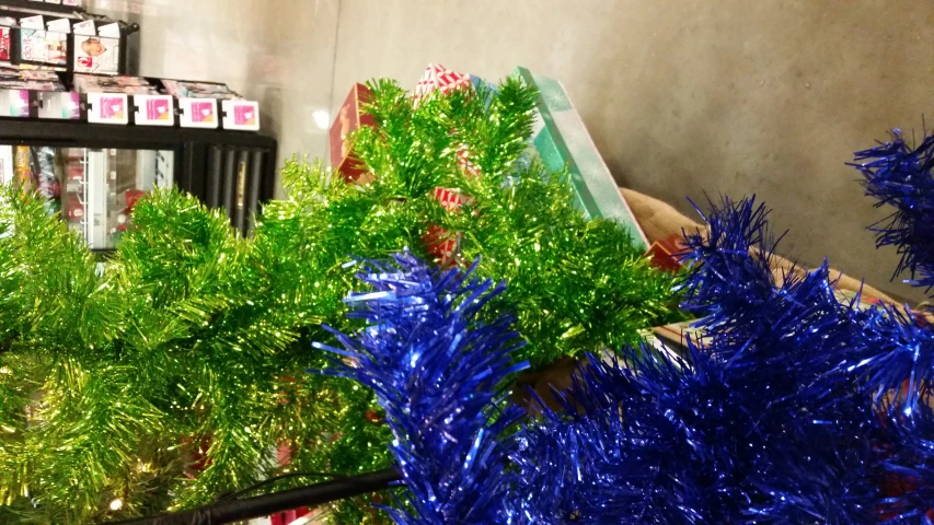 christmas trees are in the store for sale
