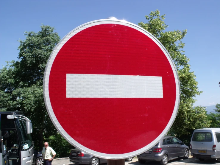 a street sign that is very large and white