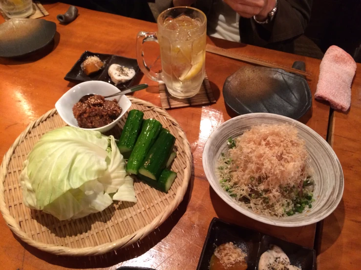 a bunch of different foods are on a table