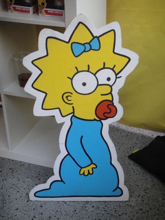 a cardboard cutout of the famous cartoon character homer long live