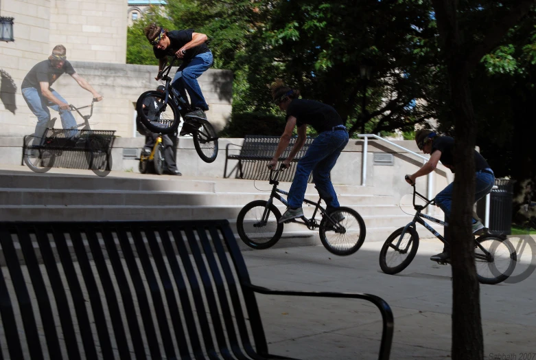 an outdoor event that has young people on bikes