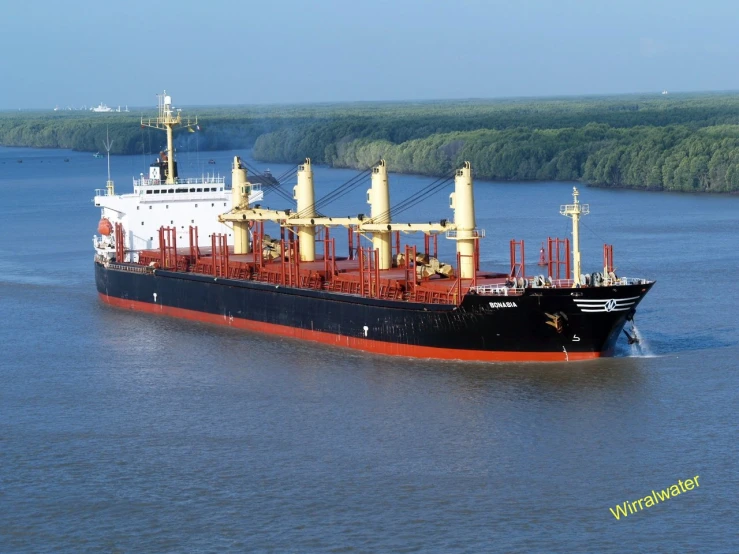 an ocean cargo ship sailing on the ocean