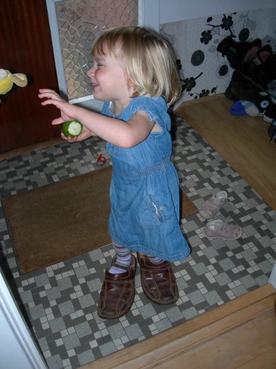 the  is eating an apple in her room