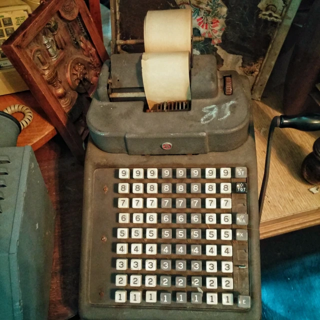 a vintage gray computer sitting on top of a desk