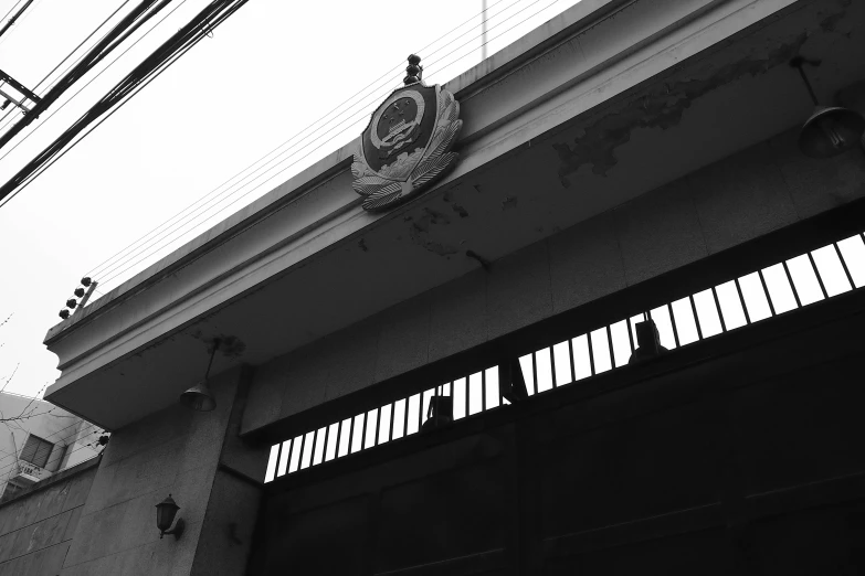 the old style clock is above the door