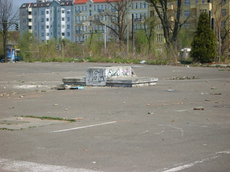 a skateboard park with graffiti on the concrete