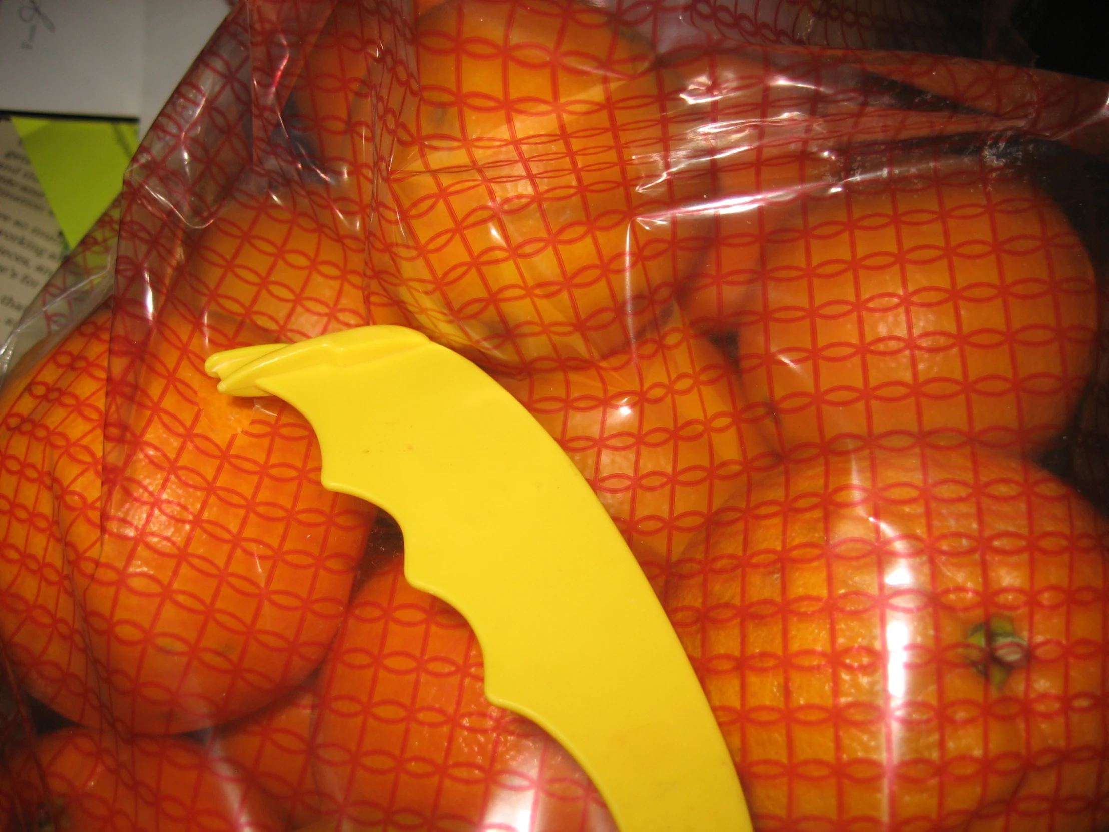 a bunch of fruit is wrapped in plastic
