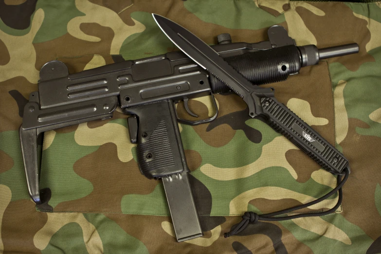 a gun that has been s down on camouflage