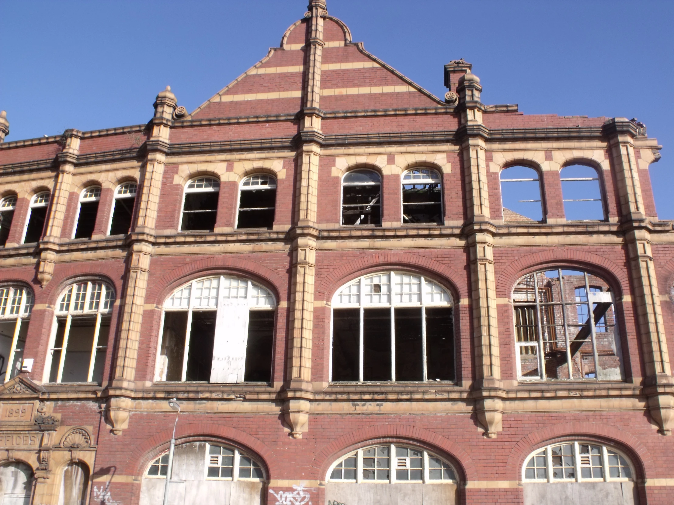 a large building with lots of windows on top of it