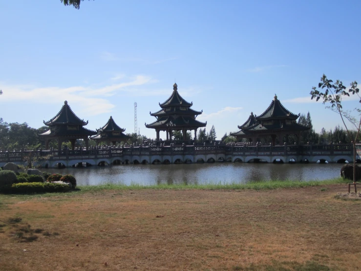 an ornate building sits on top of the water