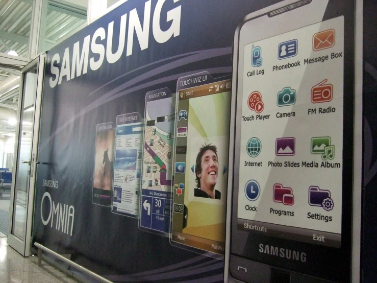 an advertit for samsung electronics in an airport