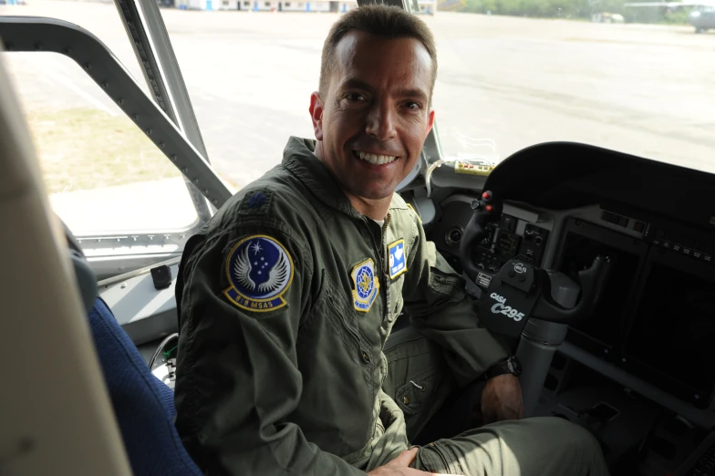 an image of a pilot smiling for the camera