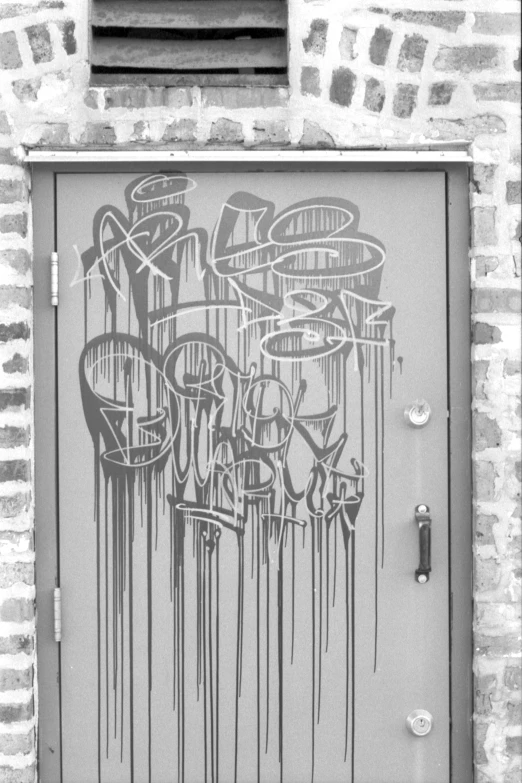 a door with grafitti and words painted on it