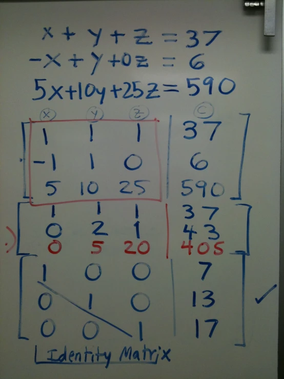 a white board has many numbers on it