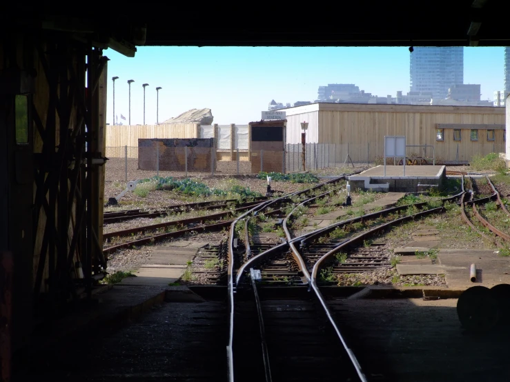 an old train yard is seen from inside the railroad