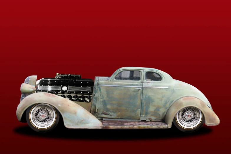 an old car with no wheels, red background