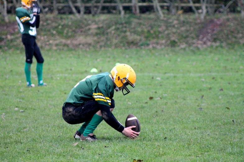 two football players in action on the field