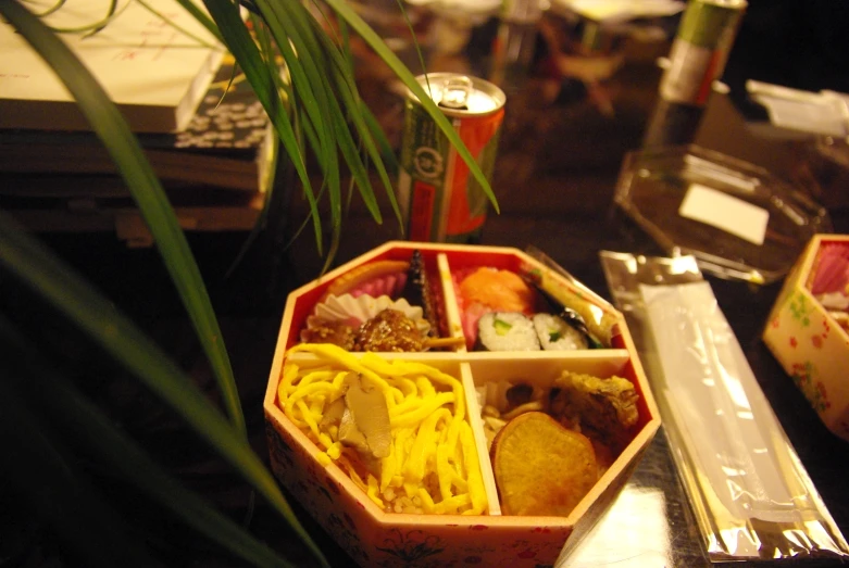 a bowl of food is shown with an assortment of sushi