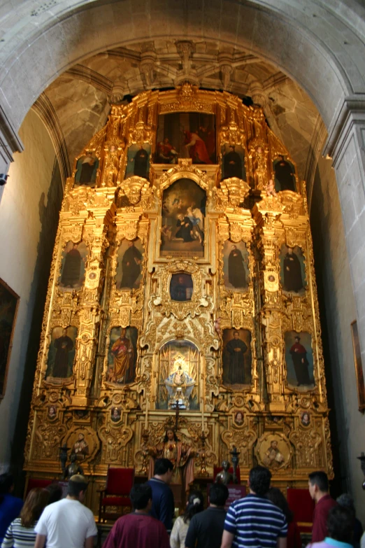 the people are standing at the alter in the church