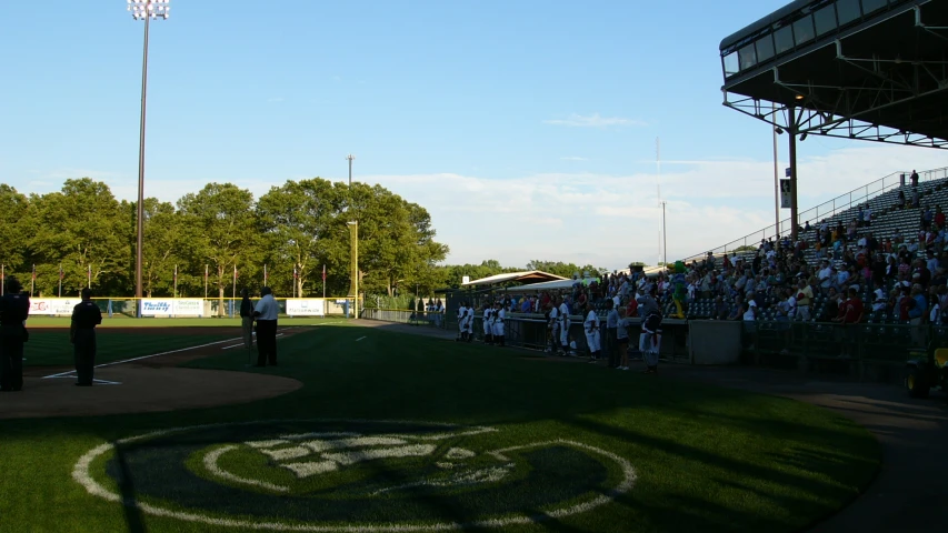 a baseball game is going on in the park