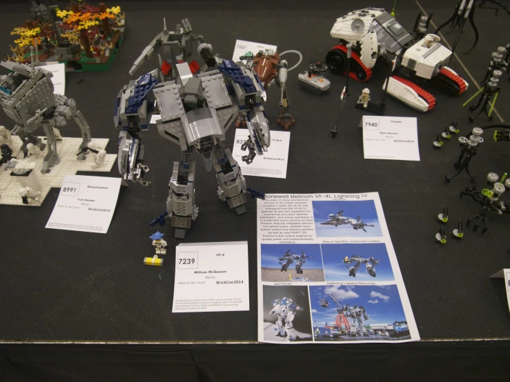 an image of toy robots on display with paper