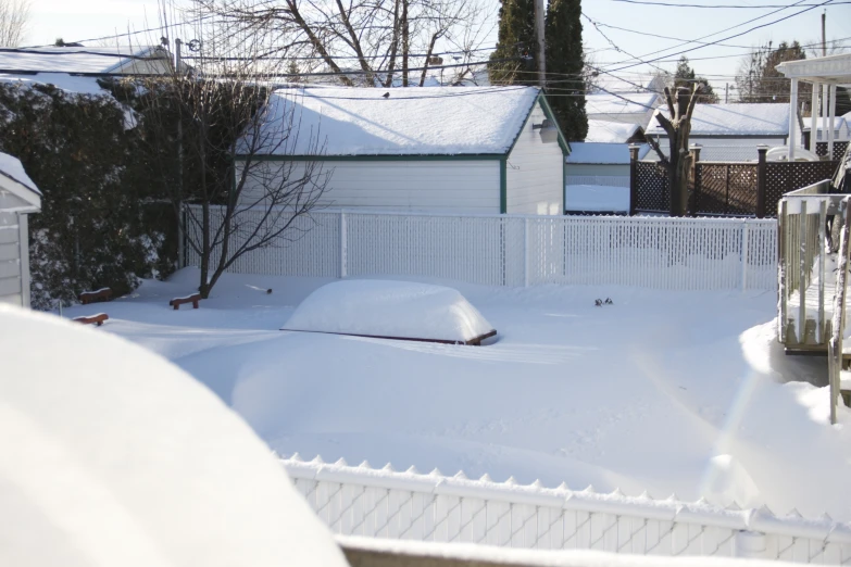 there is a snow pile on the yard