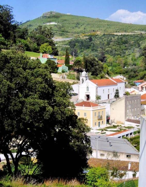 the view from the top of the hill to buildings