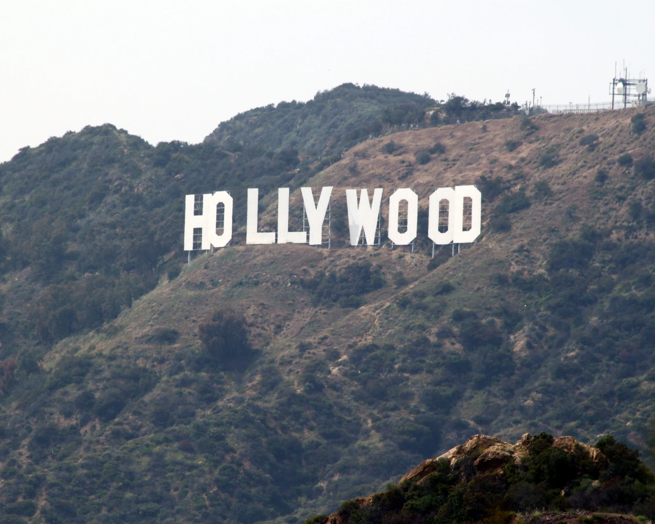 the hollywood sign is carved on a mountain