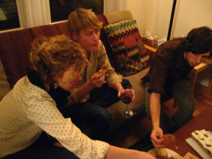 a group of people sitting around a table