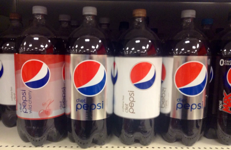 pepsi soda on display in a grocery store