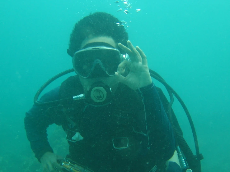 a person that is under water with a camera