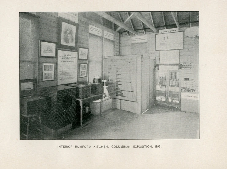 a room with refrigerator and an old picture of it