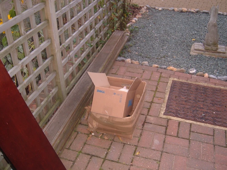 an open box outside a gated in area