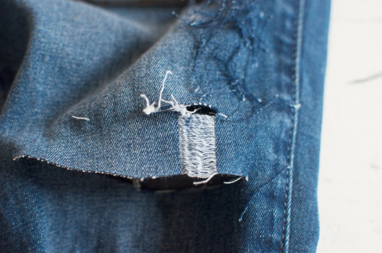 a ripped jeans piece with a single needle