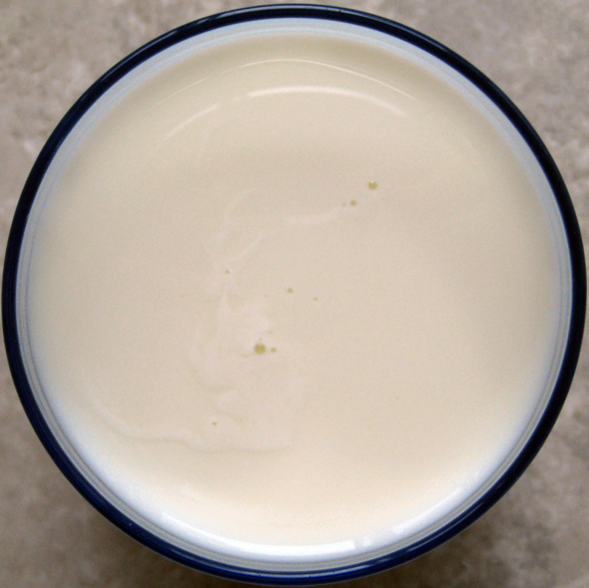 an overhead s of a bowl with a liquid inside of it