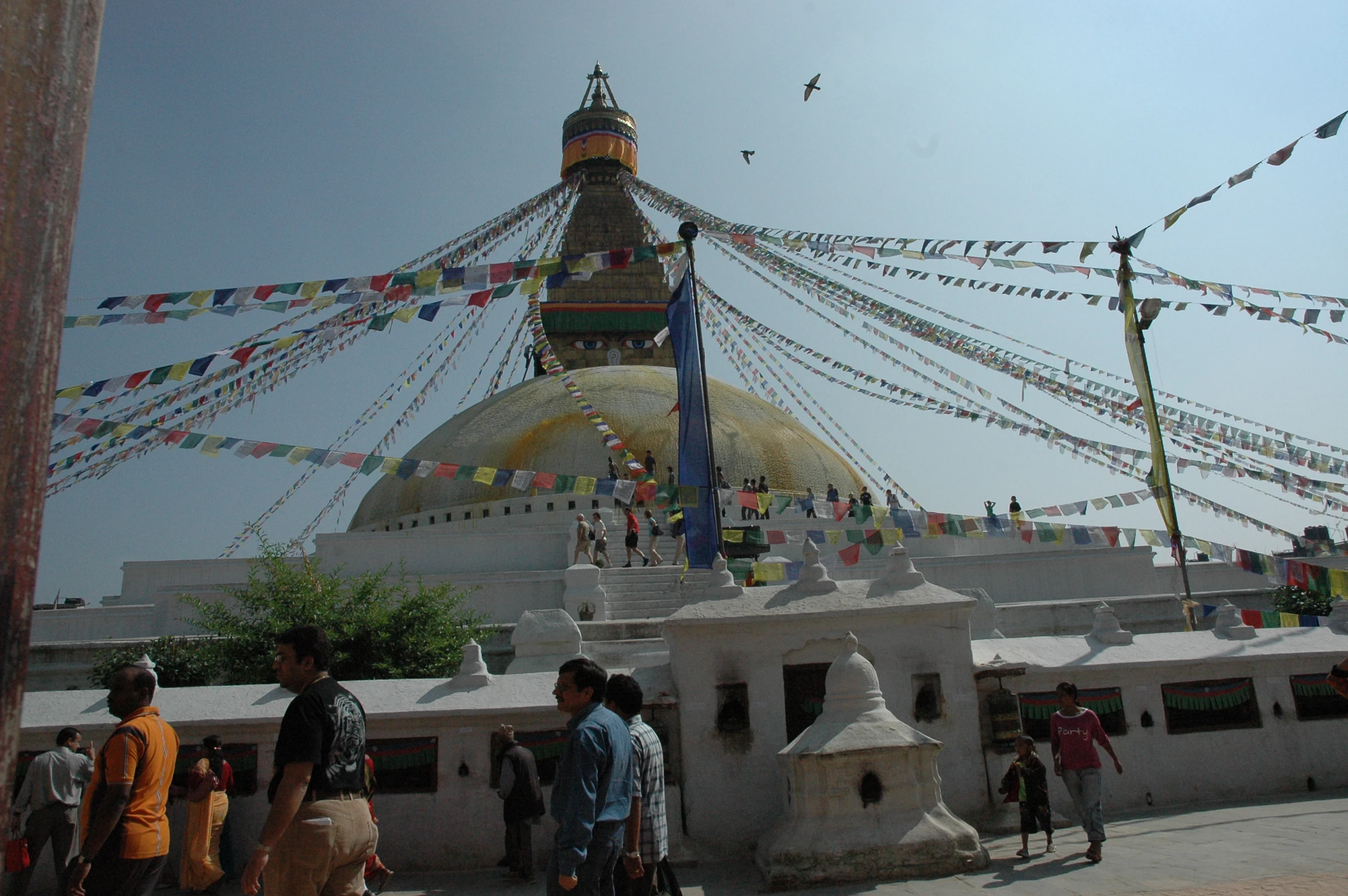 several people standing around at a temple