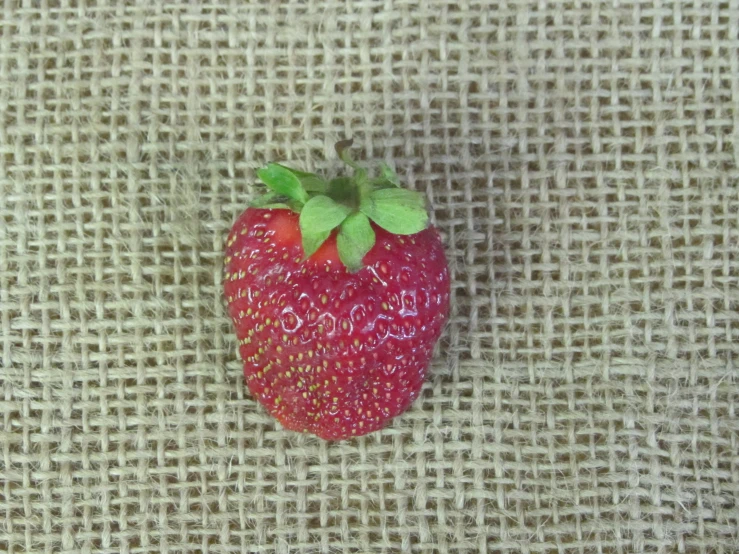 this is a po of a close up view of an strawberry